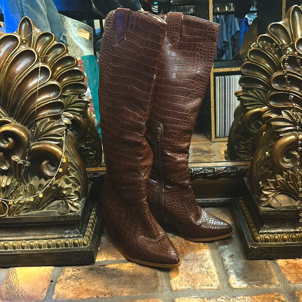 Tall heeled “alligator” print boots